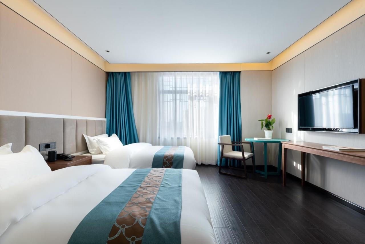 Beijing Tangfu Hotel - Located In The City Center Adjacent To The Subway Station Close To Nanluoguxiang Gulou Lama Temple Tiananmen Square Forbidden City Temple Of Heaven Providing Laundry Car Rental And Ticketing Services Buitenkant foto